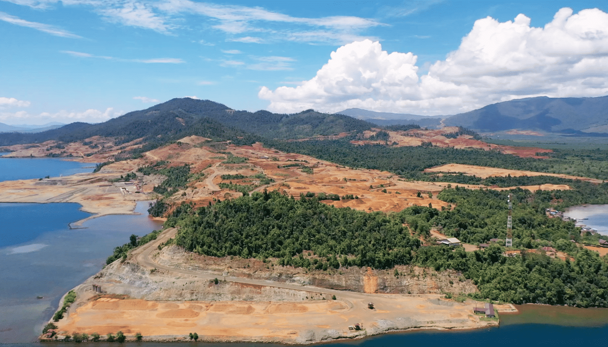 A peninsula of land beside ocean showing Nickel Mining in Indonesia  