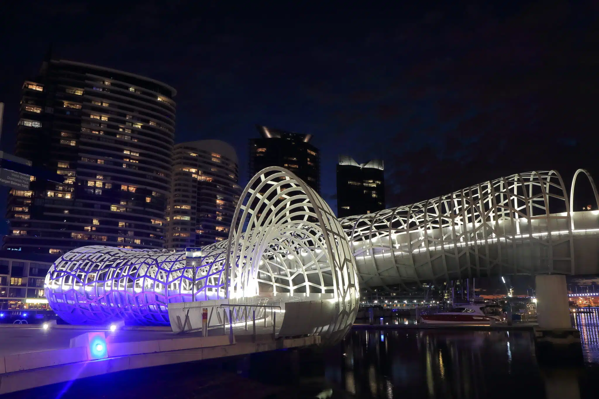 View across the marina and modern apartment blocks by the Webb Bridge in Melbourne, Australia