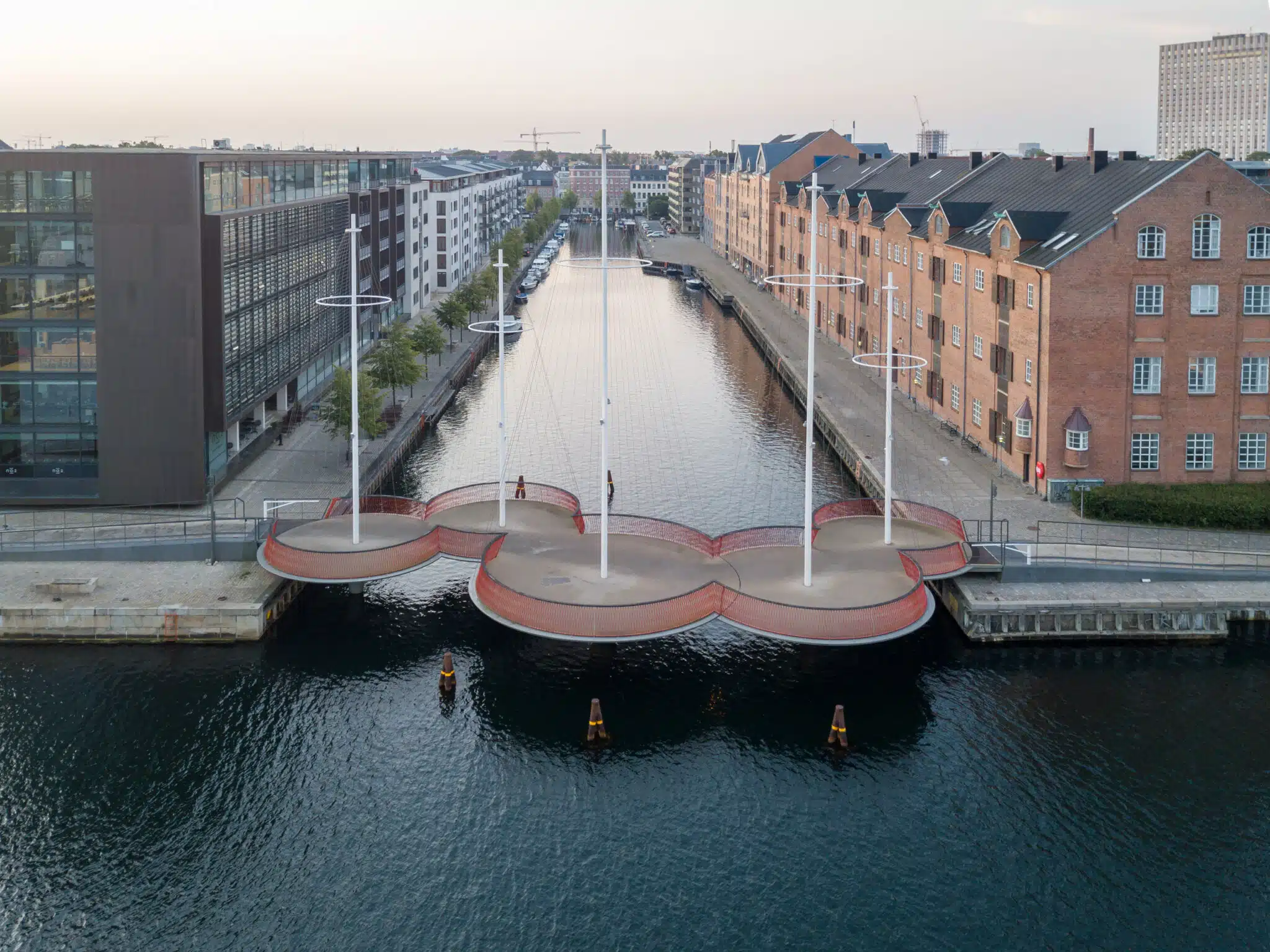 Aerial drone view of the modern Circle Bridge, a pedestrian bridge in the harbour area.